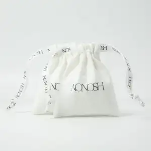 High Quality Organic Cotton Linen Drawstring Jewelry Bag Customized Mini Packaging for Bracelets Recyclable and Eco-Friendly